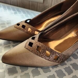Copper colored evening shoes NWOT.